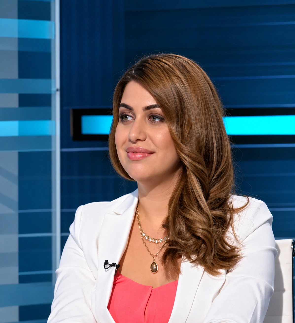 Joumana Saad presenting in a television studio
